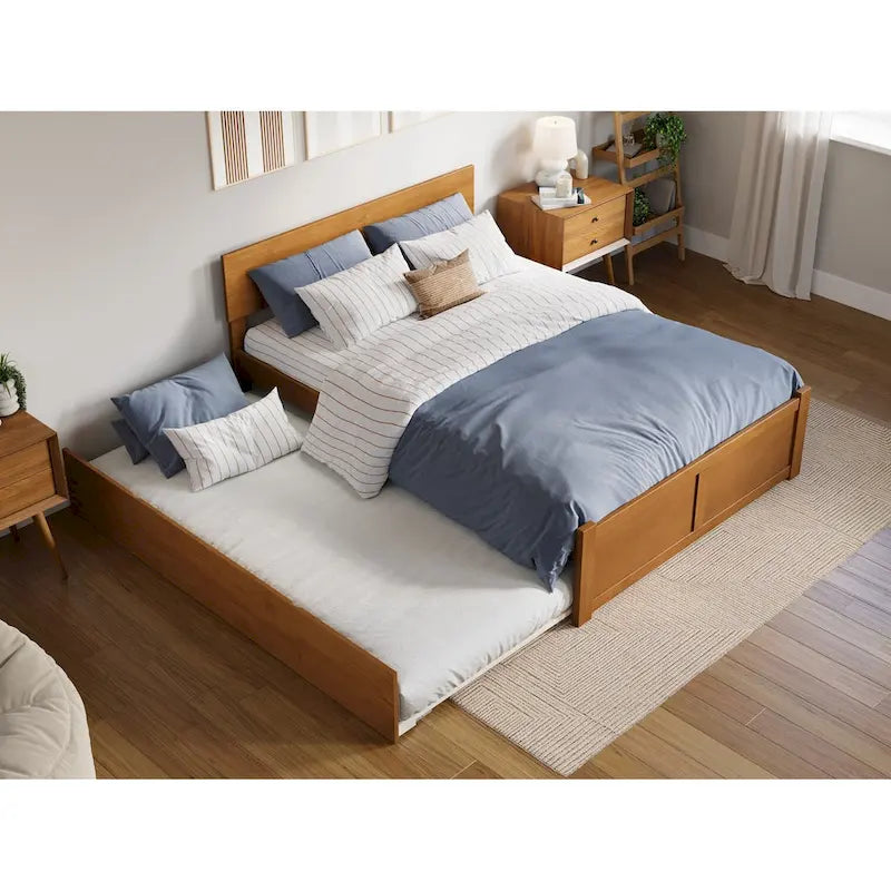Lit plateforme Orlando avec pied de lit et lit gigogne double.
